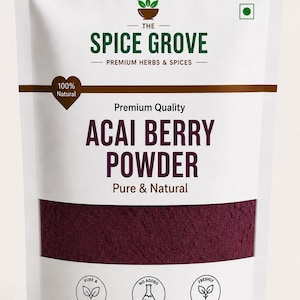 May include: A white stand-up pouch of The Spice Grove Acai Berry Powder. The label features dark green text, a brown heart icon stating 100% Natural, and a window showing deep purple powder. Includes icons for Pure & Natural, No Added Preservatives, and Freshly Sourced.