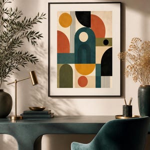 Puede incluir: Una l&aacute;mina de arte mural enmarcada con una composici&oacute;n geom&eacute;trica de c&iacute;rculos, semic&iacute;rculos y arcos en una paleta de amarillo mostaza, naranja quemado, azul verdoso profundo, verde oliva y negro sobre un fondo crema con l&iacute;neas verticales.