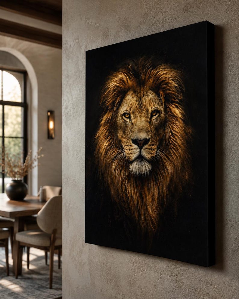 May include: A rectangular canvas wall art piece featuring a detailed portrait of a lion with a thick, golden-brown mane against a solid black background. The lion is shown from the front, displaying amber eyes, a dark nose, and textured fur.