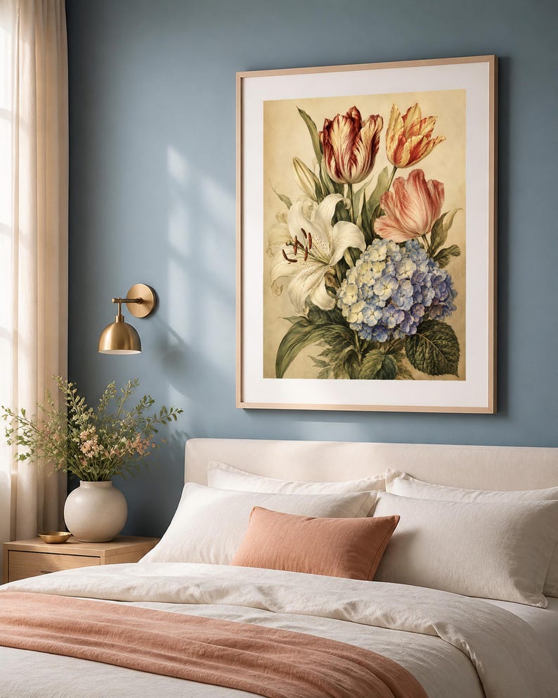 May include: A framed wall art print featuring a botanical illustration of a floral bouquet. The arrangement includes white lilies, red and yellow striped tulips, a pink tulip, and a cluster of blue and white hydrangeas on a cream background.