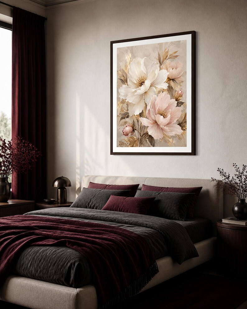 May include: A framed wall art print featuring a botanical illustration of large, layered white and soft pink peony flowers with golden-toned foliage accents, set against a neutral, textured beige background within a dark brown frame.