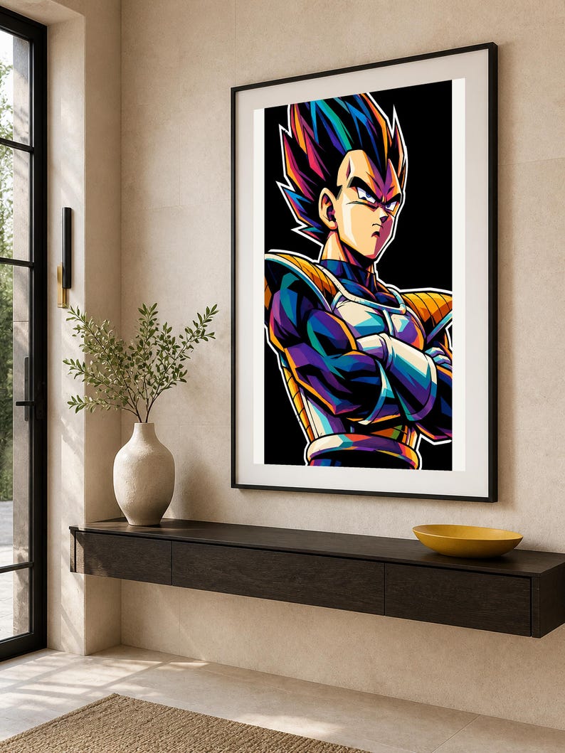 May include: A framed vertical wall art print featuring a stylized illustration of a character with spiky hair, wearing blue and yellow armor with arms crossed. The artwork uses vibrant, high-contrast colors against a solid black background.