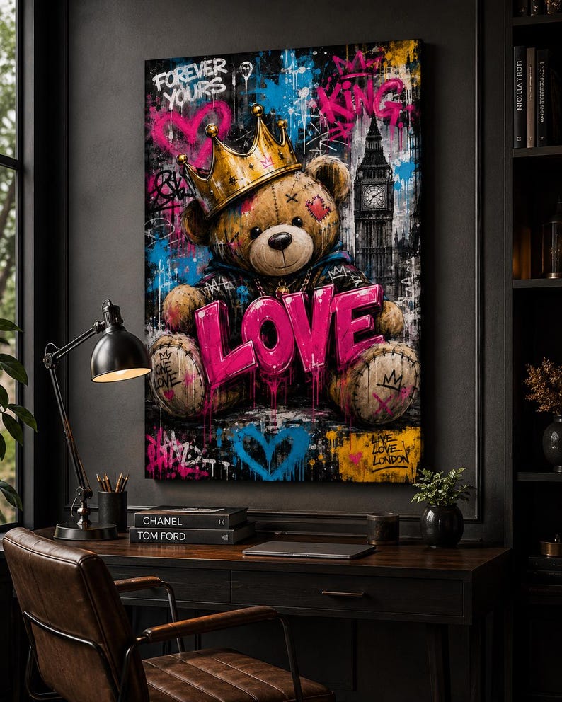 May include: A vertical wall art print featuring a brown teddy bear wearing a gold crown, set against a dark urban background with graffiti elements. The word LOVE is written in large, bright pink 3D letters across the bear's lap. The scene includes a silhouette of Big Ben, blue and pink paint splatters, and the text FOREVER YOURS, KING, and LIVE LOVE LONDON.