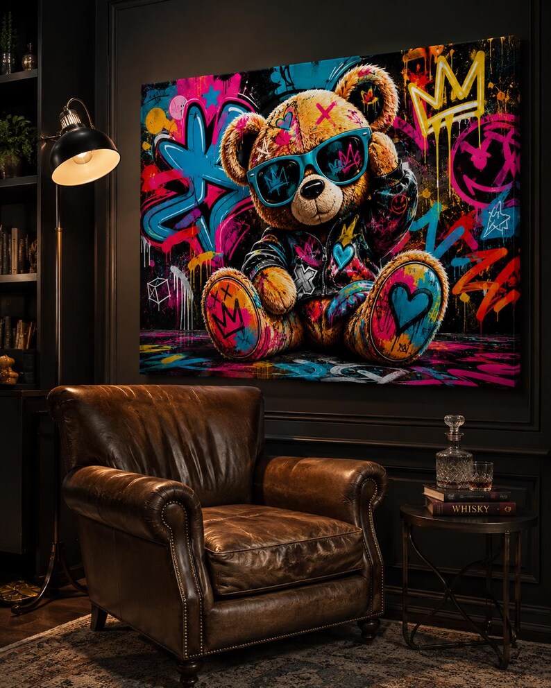 May include: A rectangular canvas wall art print featuring a brown teddy bear wearing a black jacket and blue sunglasses. The bear is surrounded by vibrant graffiti-style street art elements including bright pink, blue, and yellow paint splatters.