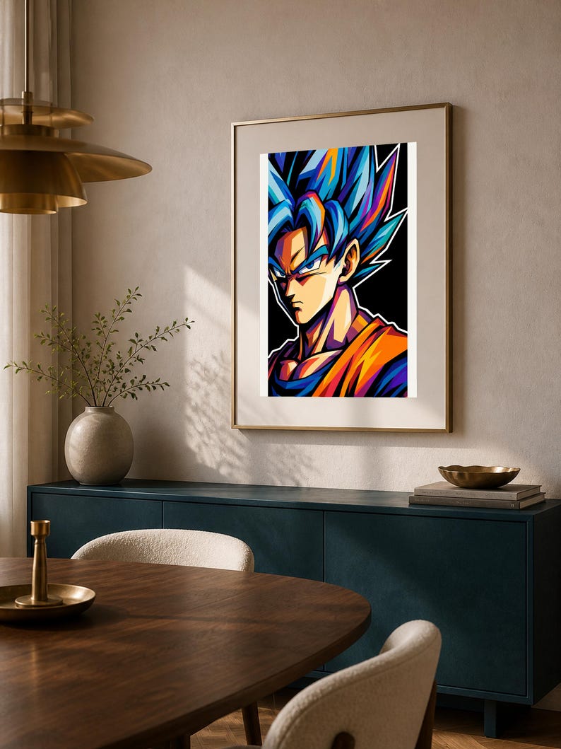 May include: A framed wall art print featuring a stylized illustration of a character with spiky blue hair, sharp facial features, and an orange gi. The artwork uses bold, vibrant colors against a solid black background, presented in a thin frame.