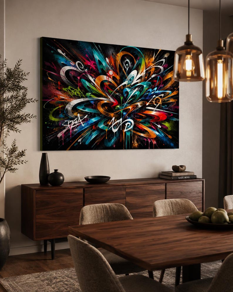 May include: A large rectangular wall art piece featuring a vibrant abstract graffiti composition with swirling lines, bold splashes of blue, orange, red, and green paint, and white stylized lettering set against a deep black background.