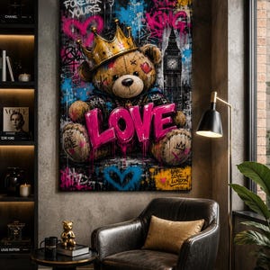 May include: A rectangular wall art print featuring a brown teddy bear wearing a gold crown, set against a dark background with graffiti-style elements, including the word LOVE in bright pink, the text FOREVER YOURS, KING, and a clock tower.