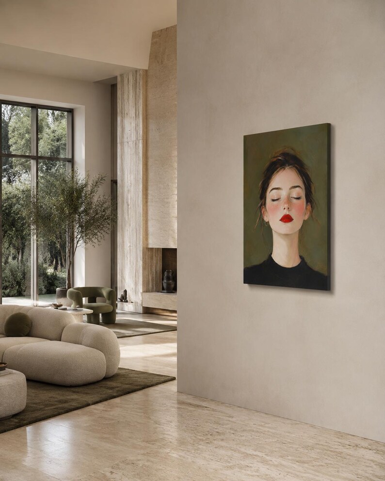 Puede incluir: Una impresi&oacute;n de arte mural rectangular que muestra el retrato de una persona con los ojos cerrados, mejillas sonrosadas y labios de color rojo brillante. El sujeto tiene el cabello oscuro recogido y viste una prenda negra.