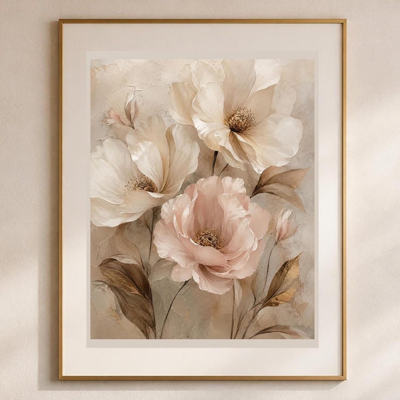 May include: A framed wall art print featuring a botanical illustration of three large, layered flowers in shades of cream, beige, and soft blush pink. The artwork includes dark brown foliage and stems set against a textured, neutral-toned background.