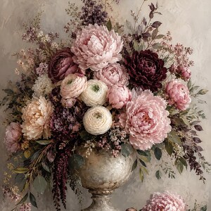 May include: A large floral arrangement in a weathered stone-colored pedestal vase, featuring a mix of peonies, ranunculus, and small filler flowers in shades of blush pink, deep burgundy, cream, and muted purple, with green foliage.