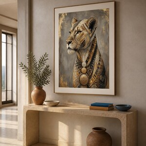 May include: A framed wall art print featuring a stylized lion portrait with intricate gold, black, and brown geometric patterns. The lion is depicted in profile, adorned with three circular medallions around its neck against a textured gray background.