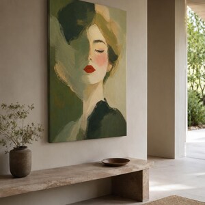 May include: A rectangular canvas painting featuring an impressionistic portrait of a person with closed eyes and vibrant red lips. The artwork utilizes a palette of olive green, sage, and cream tones with visible brushstrokes creating a soft texture.