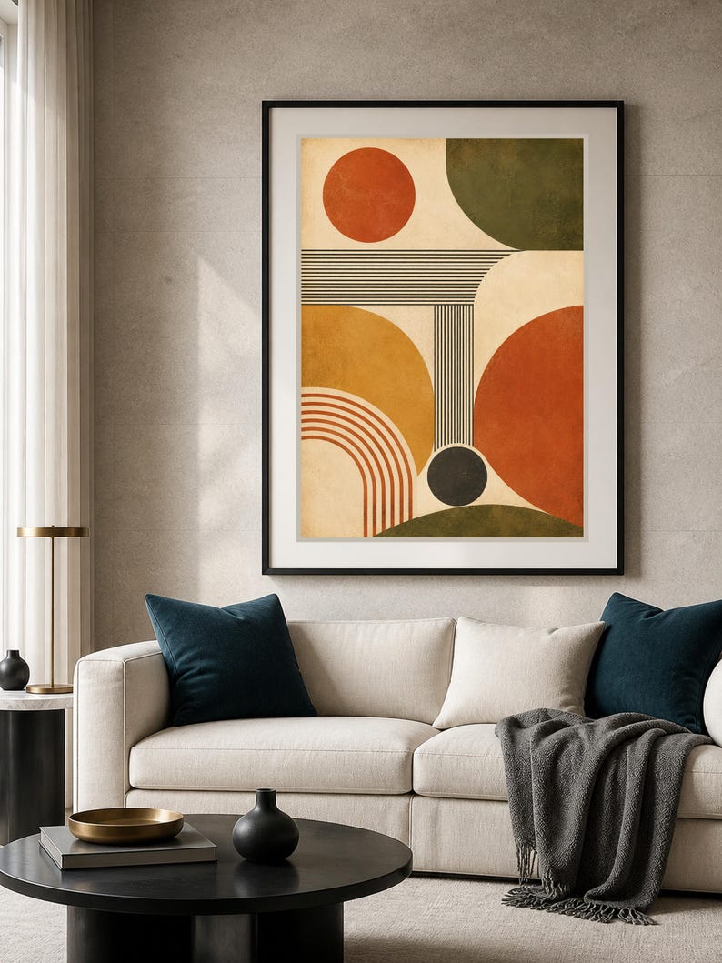Puede incluir: Una impresi&oacute;n de arte mural enmarcada que presenta una composici&oacute;n geom&eacute;trica abstracta sobre un fondo crema. El dise&ntilde;o incluye un c&iacute;rculo naranja quemado, un semic&iacute;rculo verde oscuro, un semic&iacute;rculo amarillo mostaza y un gran semic&iacute;rculo rojo terracota.