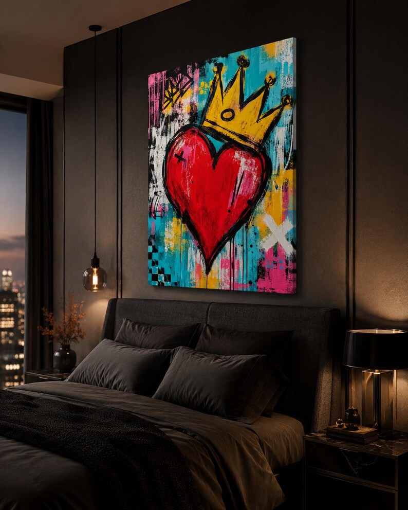 May include: A rectangular canvas wall art piece featuring a vibrant, graffiti-style painting of a large red heart topped with a yellow crown. The background is a chaotic mix of bright blue, pink, yellow, and white paint splatters and drips.