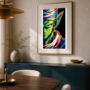 May include: A framed wall art print featuring a stylized, vibrant illustration of a green-skinned character with pointed ears, wearing a white turban and a purple garment, set against a solid black background with sharp, angular color shading.