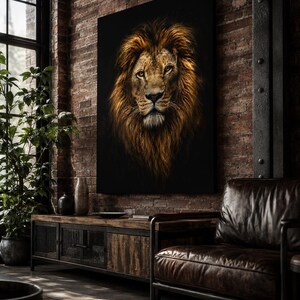 May include: A large rectangular wall art print featuring a detailed portrait of a lion with a thick, golden-brown mane against a solid black background. The lion is depicted with a focused gaze, showcasing intricate fur textures and amber eyes.