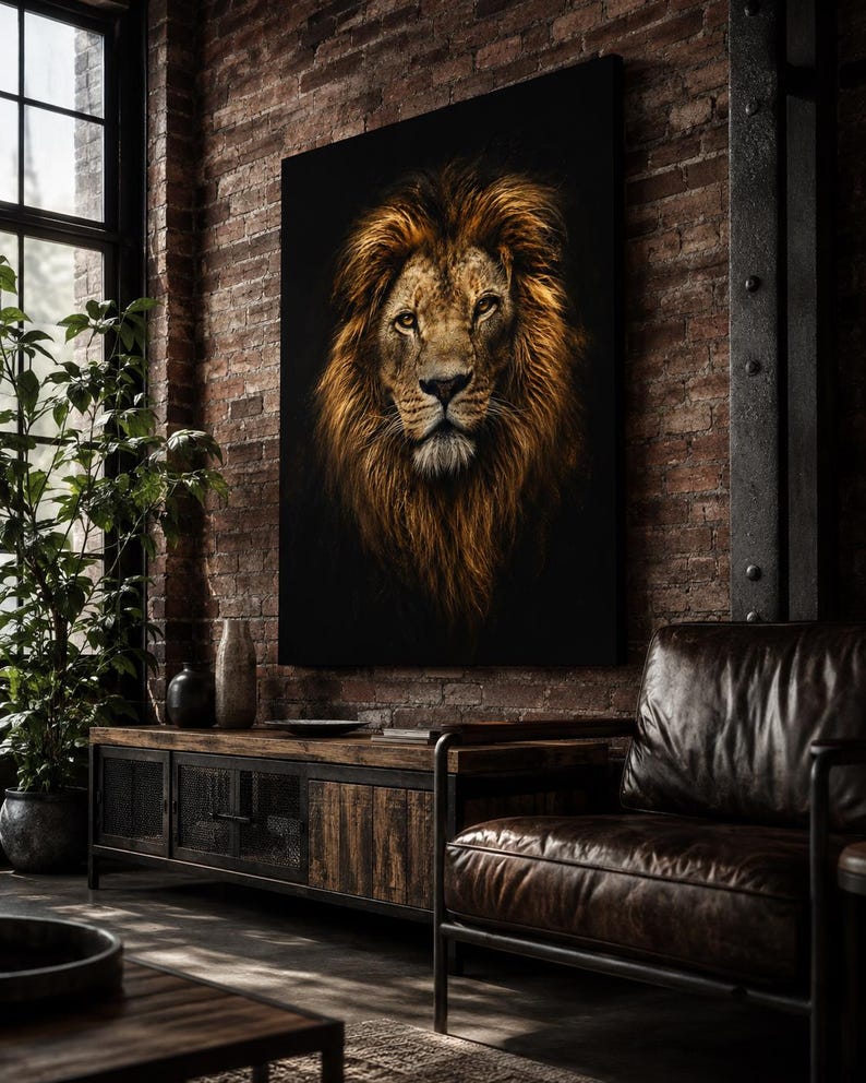May include: A large rectangular wall art print featuring a detailed portrait of a lion with a thick, golden-brown mane against a solid black background. The lion is depicted with a focused gaze, showcasing intricate fur textures and amber eyes.