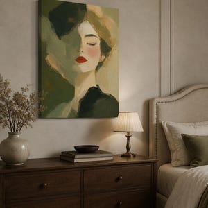 May include: A rectangular canvas wall art print featuring an impressionistic oil painting of a person with closed eyes, pale skin, and bright red lips. The portrait uses a palette of olive green, dark forest green, and soft beige tones.