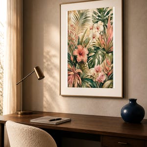 May include: A framed vertical wall art print featuring a lush tropical botanical illustration. The artwork displays vibrant pink hibiscus flowers, white orchids, and large green monstera leaves set against a warm, textured beige background.