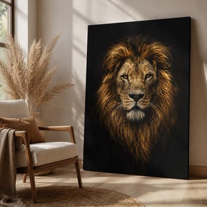 May include: A rectangular wall art print featuring a detailed portrait of a lion with a thick, golden-brown mane against a solid black background. The lion is shown from the chest up, facing forward with amber eyes and a focused expression.