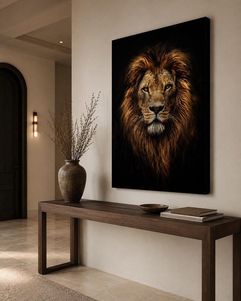 May include: A rectangular wall art print featuring a detailed portrait of a lion with a thick, golden-brown mane against a solid black background. The lion is shown from the front, looking directly forward with amber eyes and a focused expression.