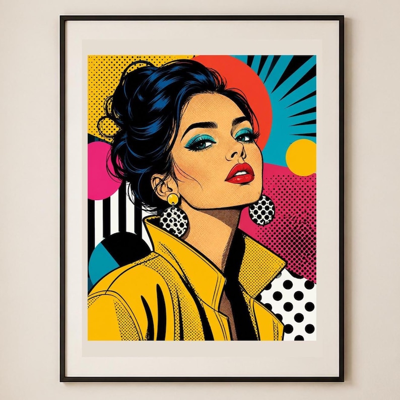 May include: A framed pop art print featuring a stylized illustration of a person with dark hair in an updo, wearing a yellow collared jacket and large circular earrings. The background consists of vibrant geometric shapes, dots, and lines.