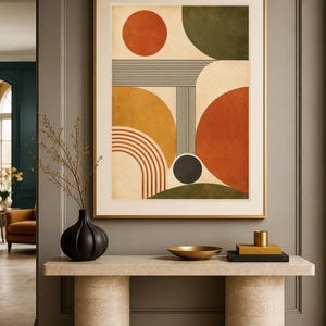 Puede incluir: Una l&aacute;mina de arte mural enmarcada que presenta una composici&oacute;n geom&eacute;trica de c&iacute;rculos, semic&iacute;rculos y l&iacute;neas paralelas en tonos naranja quemado, amarillo mostaza y verde oliva sobre un fondo crema, en un marco fino de color dorado.
