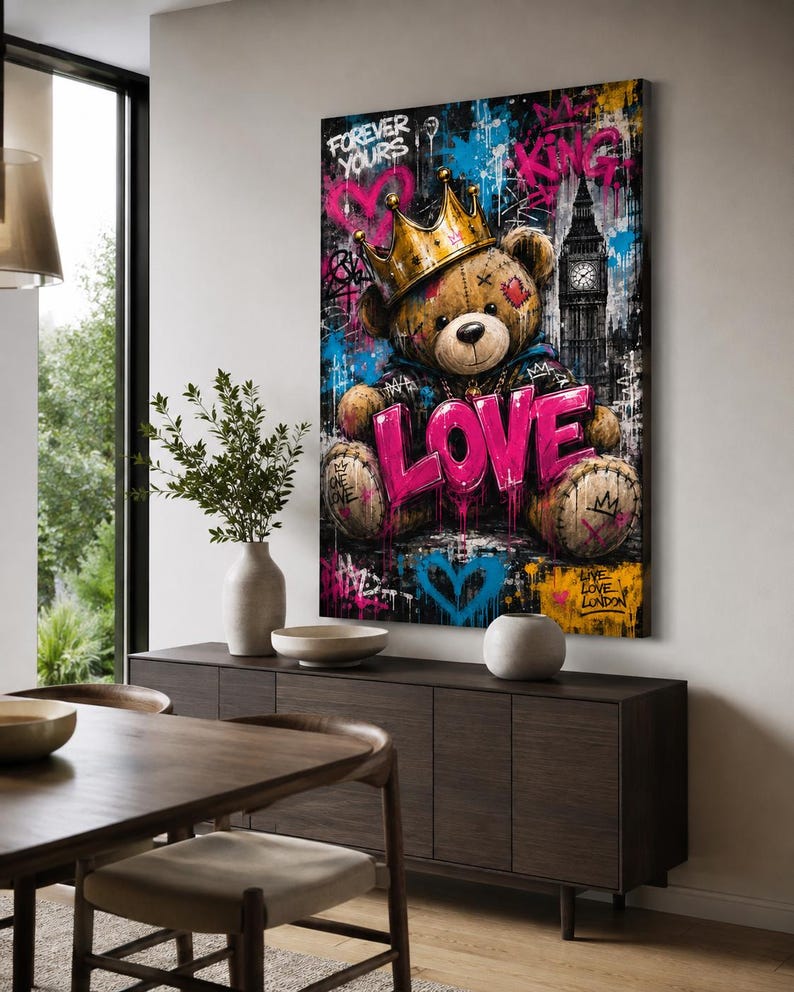 May include: A vertical wall art print featuring a brown teddy bear wearing a gold crown, centered against a dark background with graffiti-style text including "FOREVER YOURS," "KING," "LOVE," and "LIVE LOVE LONDON," alongside a depiction of Big Ben.