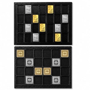 May include: Two black rectangular display trays containing small bullion bars. The top tray holds Valcambi Suisse 1g silver and gold bars. The bottom tray holds Geiger Edelmetalle 1g gold and silver square bars, each featuring a castle emblem and text.