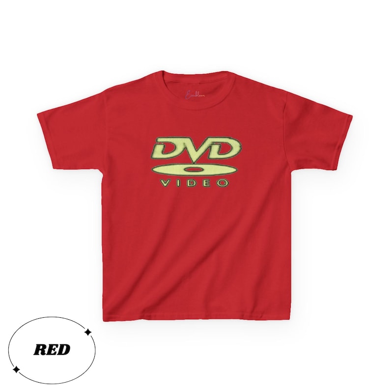 May include: A bright red short-sleeved t-shirt featuring a graphic on the chest. The graphic displays the text DVD VIDEO in a stylized, light-colored font with a disc icon positioned between the two lines of text, centered on the shirt.