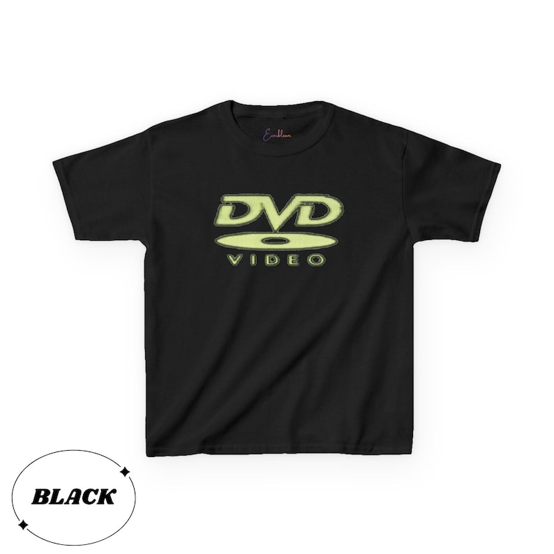May include: A black short-sleeved t-shirt featuring a light yellow graphic on the chest that displays the text DVD VIDEO with a stylized disc icon. The shirt has a crew neckline and a standard fit, with the word BLACK printed in a circle below.