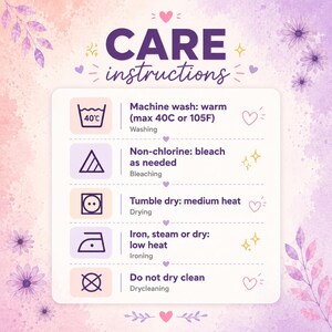 May include: A care instructions chart with a watercolor background featuring purple and pink flowers. The text reads: CARE instructions, Machine wash: warm (max 40C or 105F), Non-chlorine: bleach as needed, Tumble dry: medium heat, Iron, steam or dry: low heat, Do not dry clean.