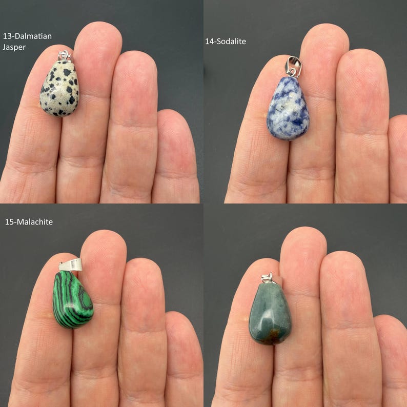 May include: Four teardrop-shaped stone pendants with silver-toned bails. The collection includes a cream and black spotted Dalmatian Jasper, a blue and white Sodalite, a green and black striped Malachite, and a smooth, solid dark green stone pendant.