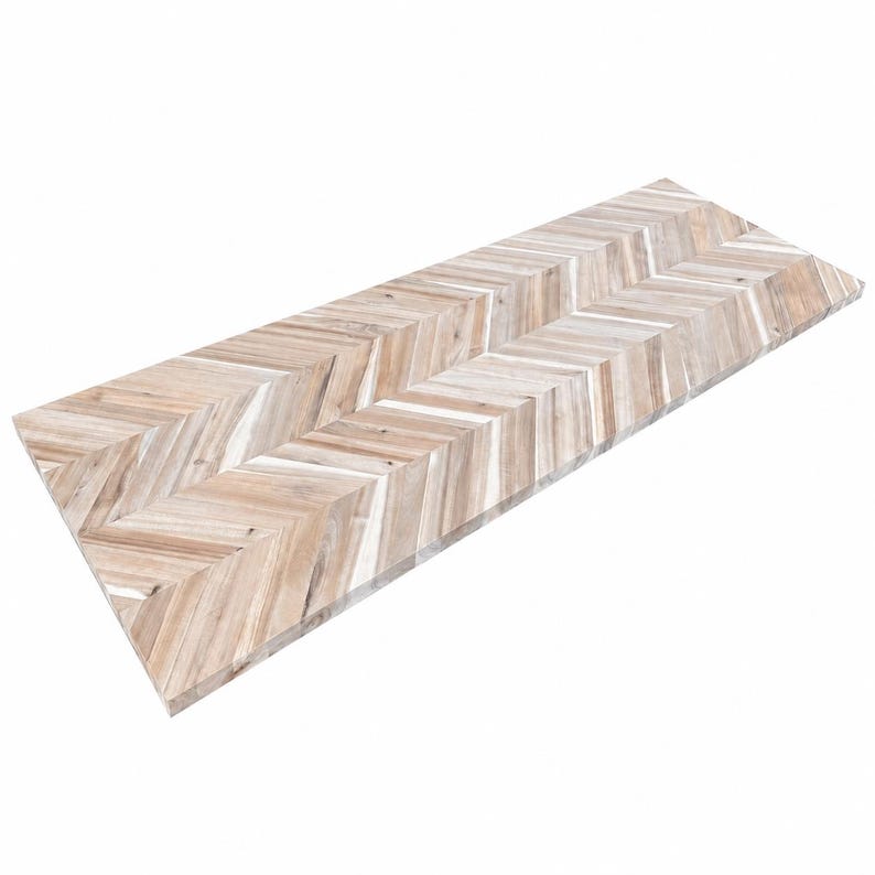 May include: A rectangular wooden board featuring a light brown and cream chevron pattern. The surface is composed of multiple narrow, angled wood planks arranged in a repeating V-shaped design, showcasing natural wood grain and color variations.