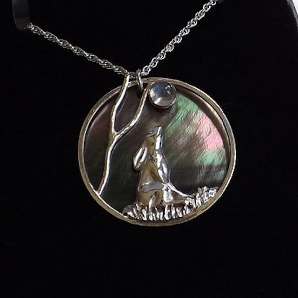 Handcrafted Moon Gazing Hare Pendant in Fine and Sterling Silver and featuring a Rainbow Moonstone. Hand cast and forged in Cornwall, UK.