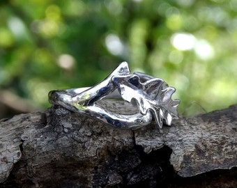 Hand-forged Sterling Silver twig and oak leaf ring.  Custom made to size.  Ring overlaps to allow some adjustment. Made in Cornwall, UK