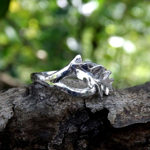 Hand-forged Sterling Silver twig and oak leaf ring.  Custom made to size.  Ring overlaps to allow some adjustment. Made in Cornwall, UK