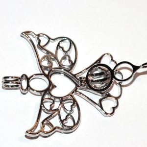 Angel Pearl Cage Charm Necklace. Hidden Hearts Necklace