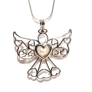 Angel Pearl Cage Charm Necklace. Hidden Hearts Necklace