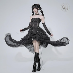 May include: A black strapless corset dress featuring a layered, high-low skirt with lace trim, paired with matching lace arm warmers and a choker. The bodice includes vertical boning and decorative lacing, while the skirt has a ruffled, voluminous silhouette.