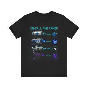 May include: A black t-shirt featuring the text ON-CALL AND ARMED above four illustrations of futuristic ray guns. Each gun is paired with a tech logo and label: Docker, Kubernetes, Ansible, and Terraform, displayed in blue and purple hues.