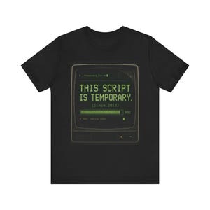 May include: A black short-sleeved t-shirt featuring a graphic of a computer monitor displaying green text that reads: $ ./temporary_fix.sh THIS SCRIPT IS TEMPORARY. (Since 2018) with a progress bar at 99% and the text # TODO: rewrite later at the bottom.
