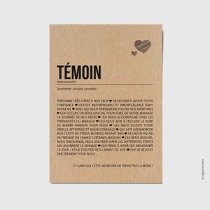 Peut inclure: Une carte rectangulaire en papier kraft brun avec le mot TÉMOIN imprimé en noir, suivi d'une définition et d'une liste de phrases descriptives en français séparées par des petits cœurs noirs, avec deux cœurs dessinés en haut à droite.