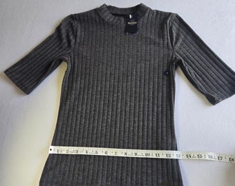 Top de punto acanalado Hollister gris talla S