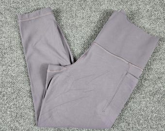 Athleta Salutation Stash 7/8 Tight Leggings Womens Medium Petite Purple Pockets