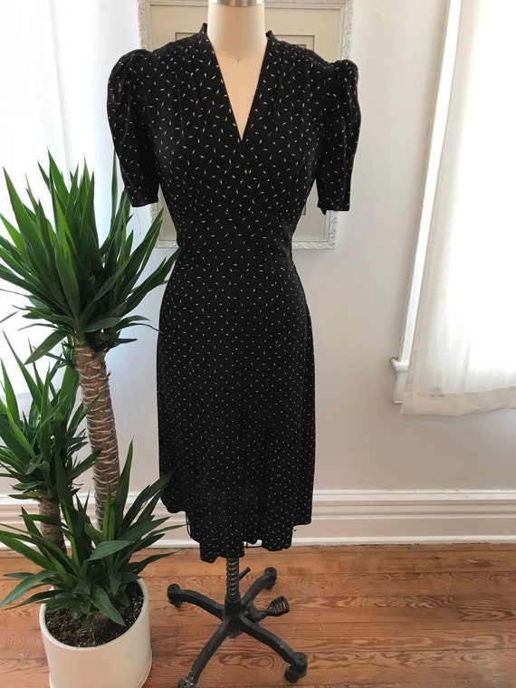 1940s black and white jacket and puff sleeve dress