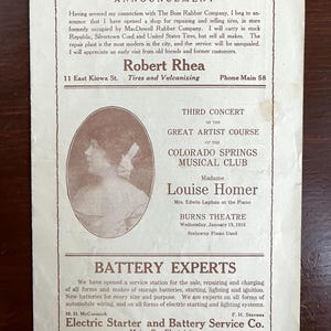 May include: A vintage off-white paper advertisement featuring brown text. The top section announces Robert Rhea's tire shop. The middle section details a concert by Madame Louise Homer at the Burns Theatre. The bottom section lists Battery Experts.