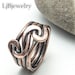 see more listings in the Knot Rings section