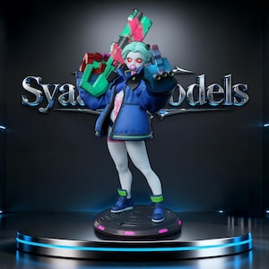 以下が含まれることがあります： ミントグリーンの髪をしたキャラクターのコレクターズフィギュア。青いジャケット、白いレギンス、青いスニーカーを着用しています。キャラクターは鮮やかな緑とピンクの大きな未来的な銃を構えており、口にはピンクのガムの風船が膨らんでいます。