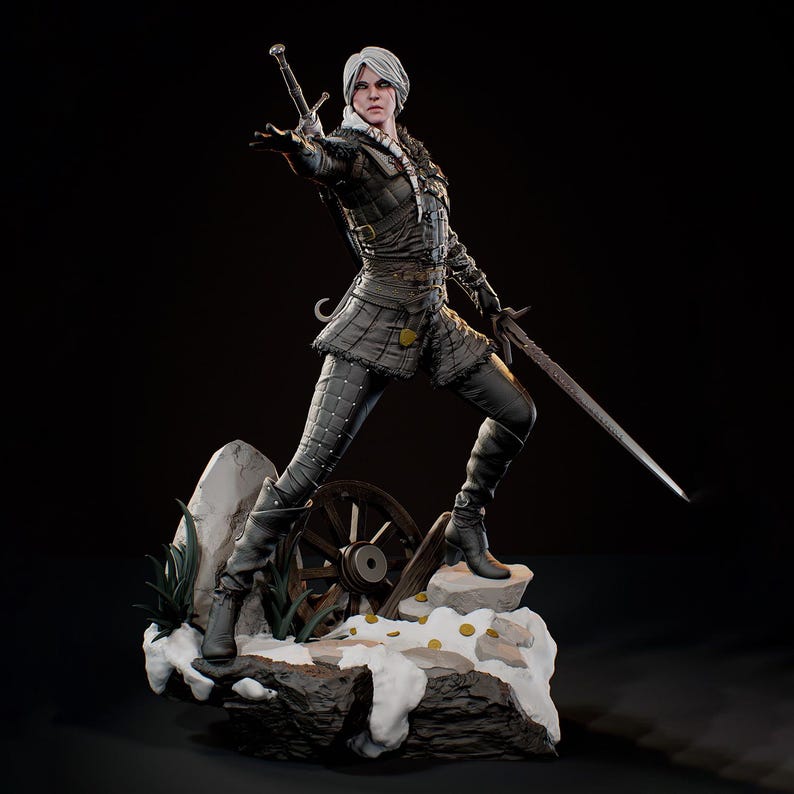 May include: A detailed figurine of a white-haired warrior in dark leather armour, holding a sword in one hand and extending the other. The character stands on a snowy base featuring a wooden wagon wheel, scattered gold coins, and rocky terrain.